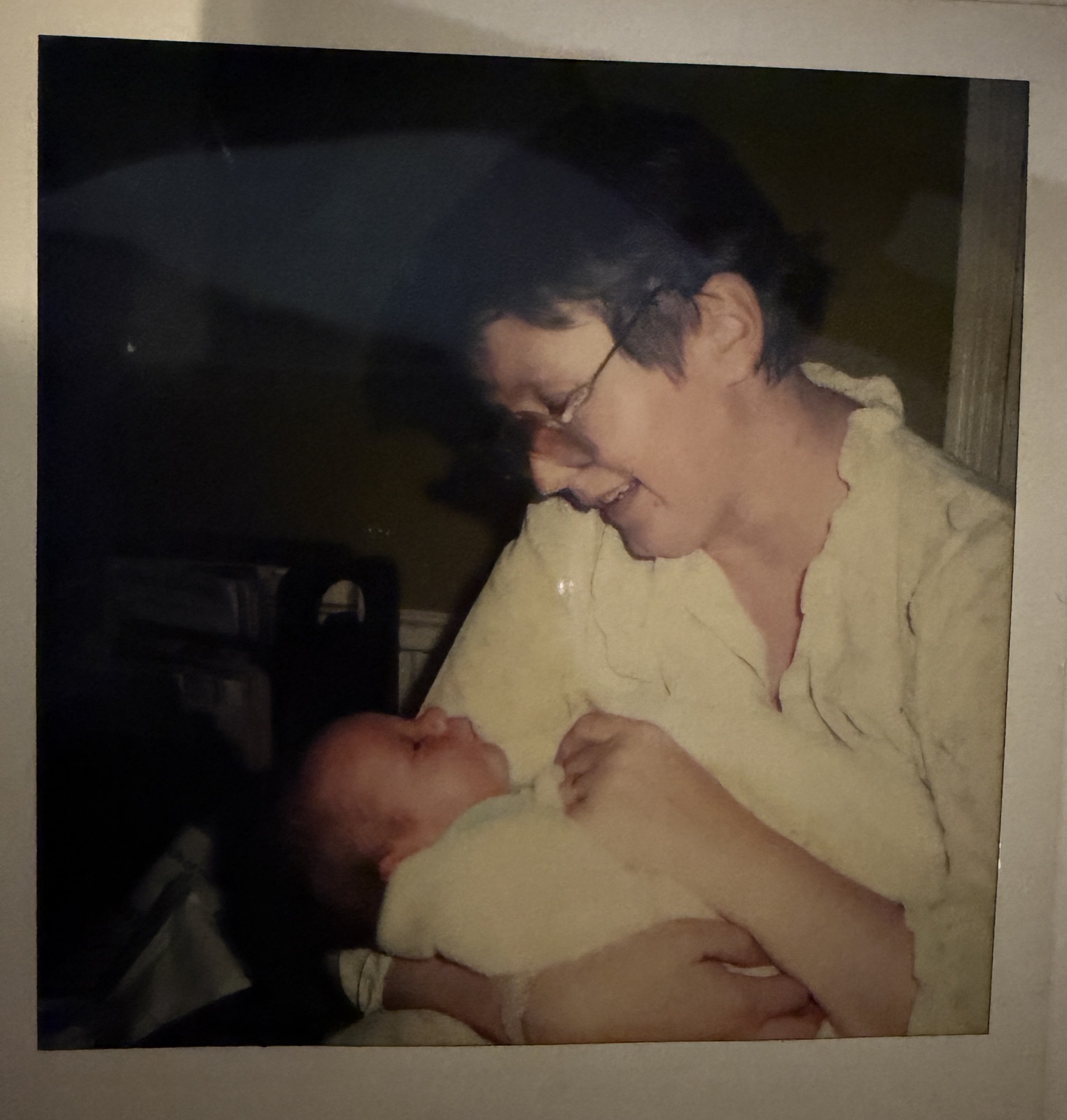 Ava cradling newborn Melissa