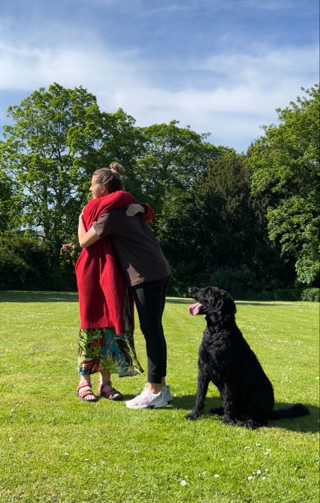 Ava and Melissa embracing in the park